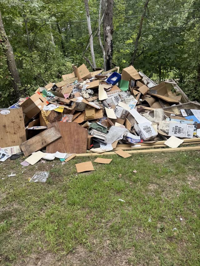 Cardboard, scrap lumber and old paperwork from a building clean out